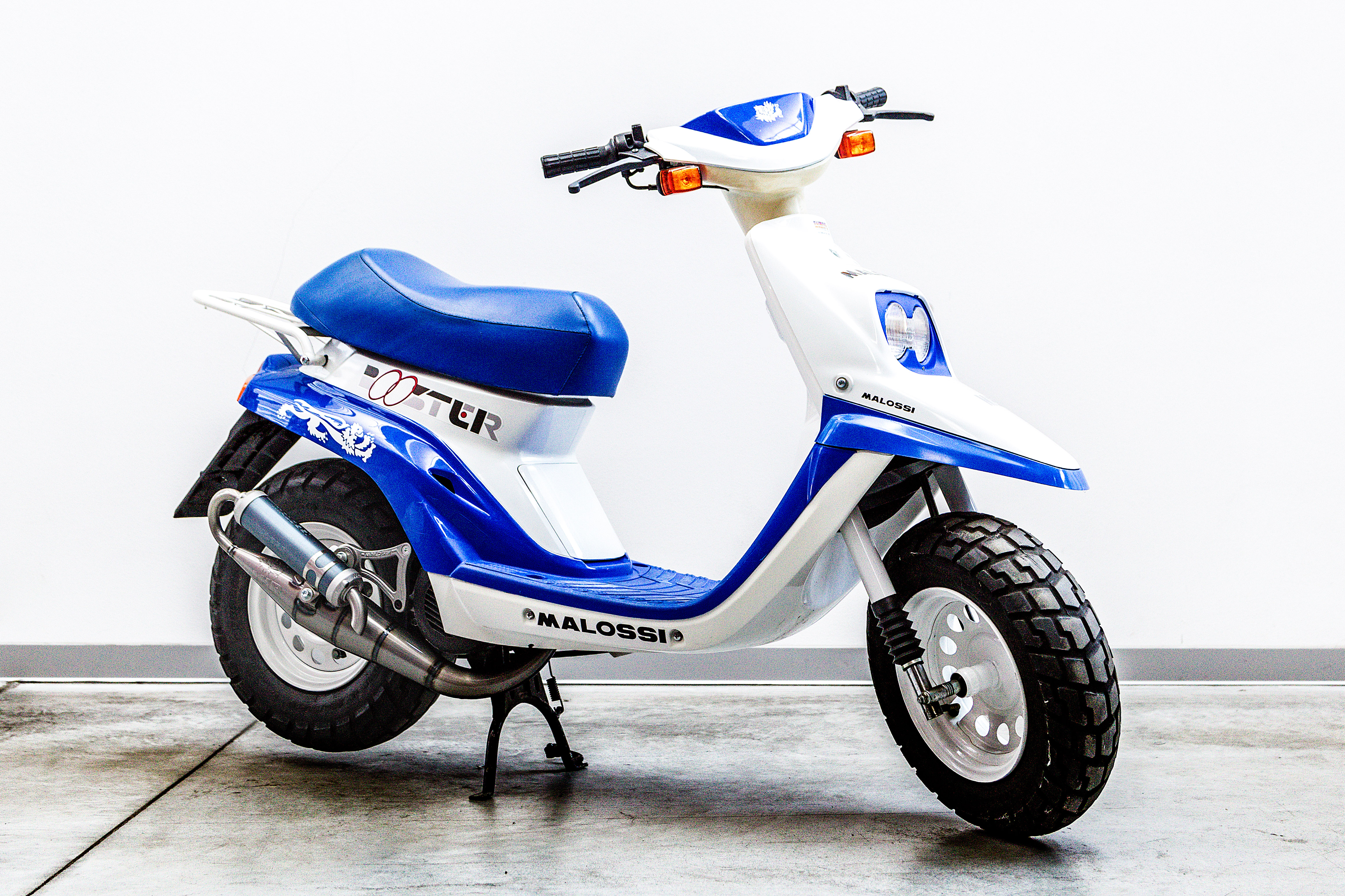 Malossi60  1990: The automatic scooter revolution. The first kits for MBK  Booster and Honda DIO are created - Malossi S.p.A. - Official website  Malossi S.p.A. – Official website